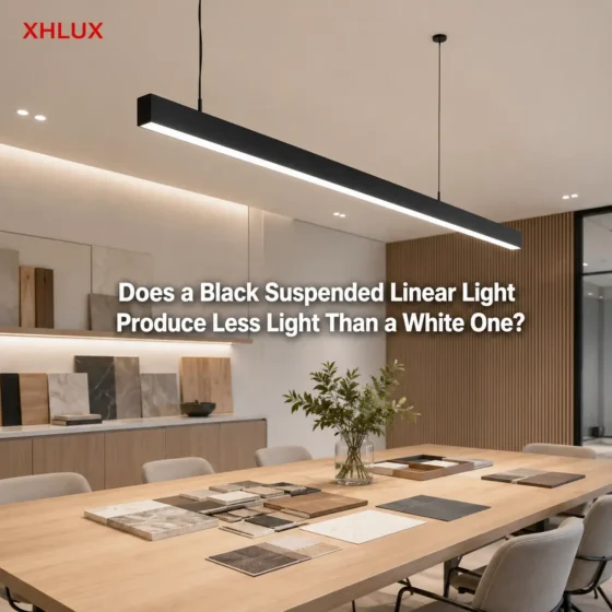 Does a black suspended linear light produce less light than a white one